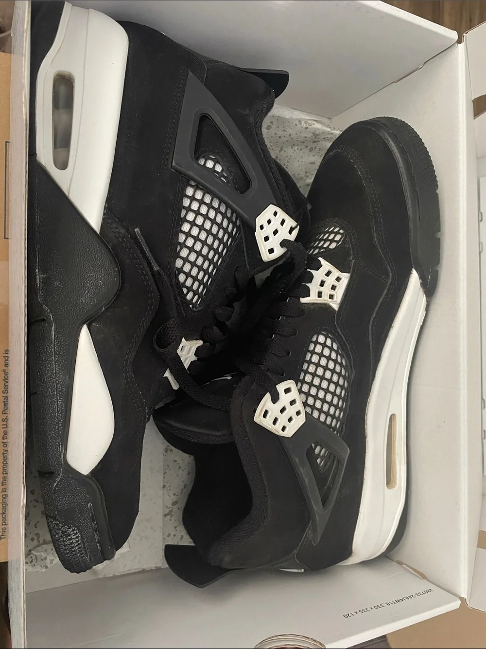 Black and White Jordan 4 Retro Thunder size 9 with box